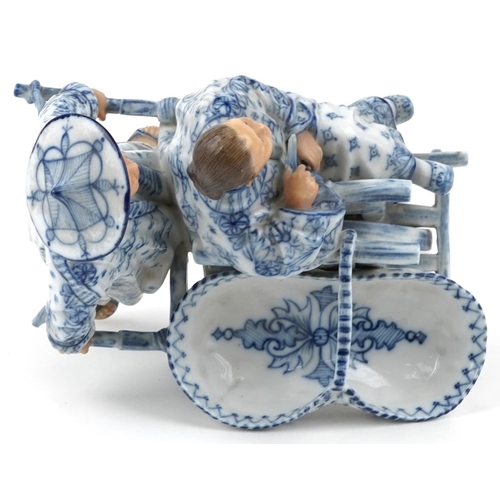 72 - 19th century European porcelain sweetmeat dish in the form of a Chinaman with rickshaw