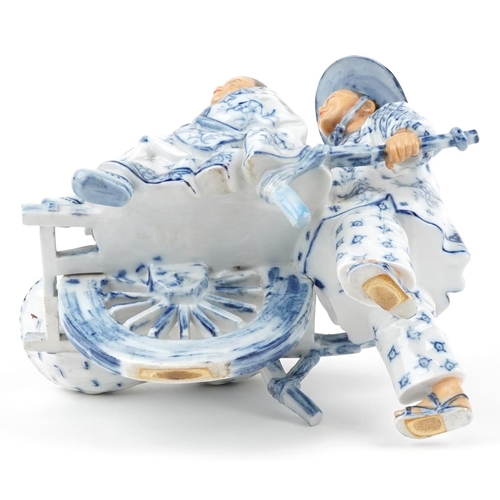 72 - 19th century European porcelain sweetmeat dish in the form of a Chinaman with rickshaw