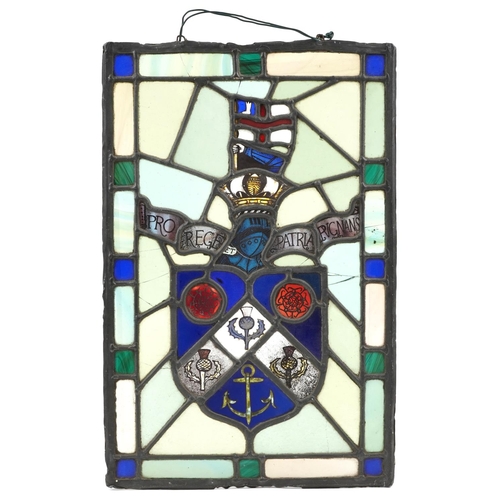 Antique leaded stained glass panel with heraldic crest inscribed Pro Rege Et Patria Rvgnans, 44.5cm x 29.5cm