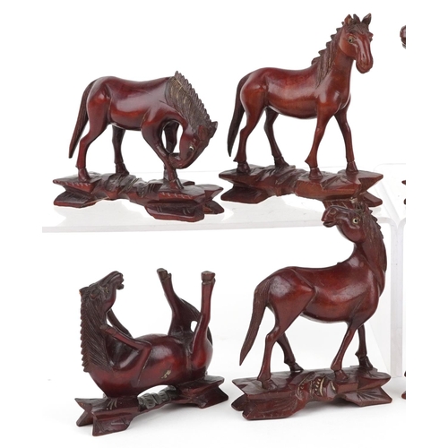 1364 - Eight Chinese carved hardwood horses of Wang Mu, 14cm wide