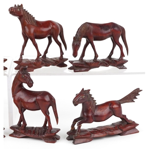 1364 - Eight Chinese carved hardwood horses of Wang Mu, 14cm wide