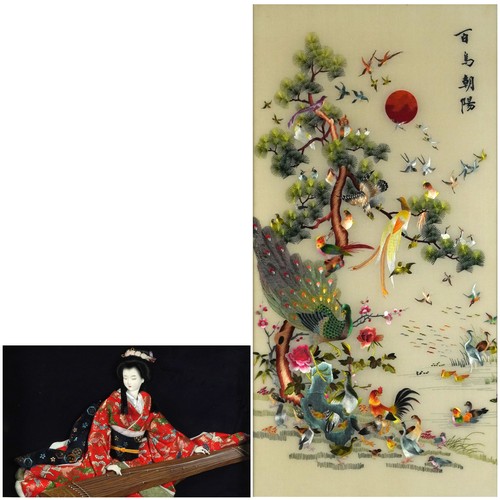 563 - Chinese silk panel embroidered with birds of paradise amongst a tree and a framed doll, the largest ... 