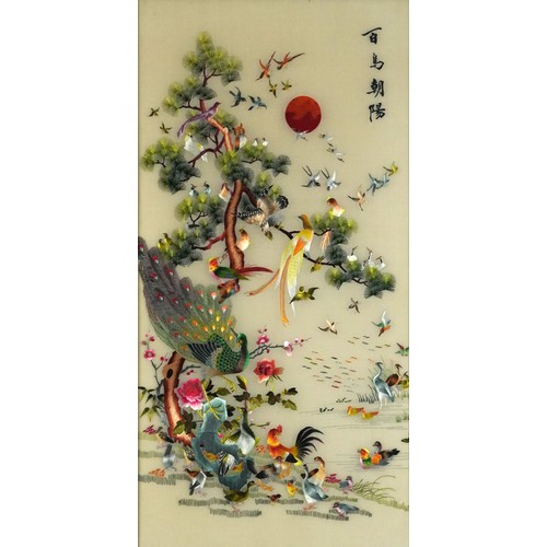 563 - Chinese silk panel embroidered with birds of paradise amongst a tree and a framed doll, the largest ... 