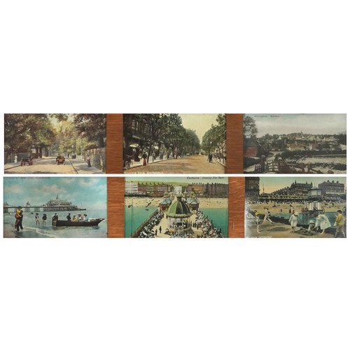 1311 - Pair of Arts & Crafts oak wall frames housing postcards of Eastbourne and surrounding including Term... 