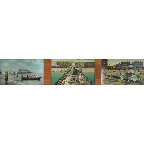 1311 - Pair of Arts & Crafts oak wall frames housing postcards of Eastbourne and surrounding including Term... 