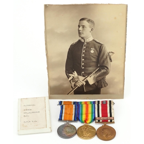 611 - British military World War I three medal group with photograph of soldier in question, comprising a ... 