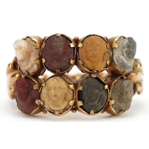 2020 - 19th century Grand Tour unmarked gold ring set with eight lava cameos carved with classical busts, s... 