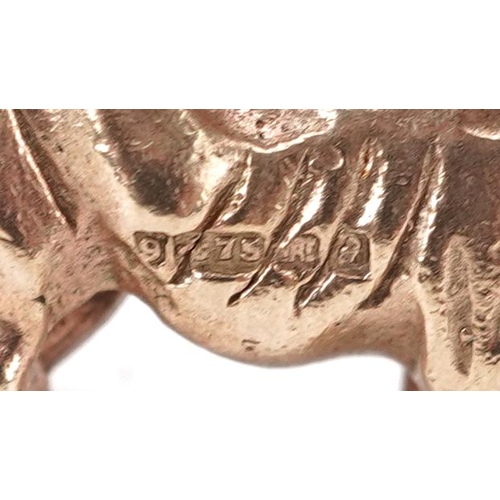 2099 - 9ct gold charm in the form of a Jersey cow, 1.9cm wide, 3.4g