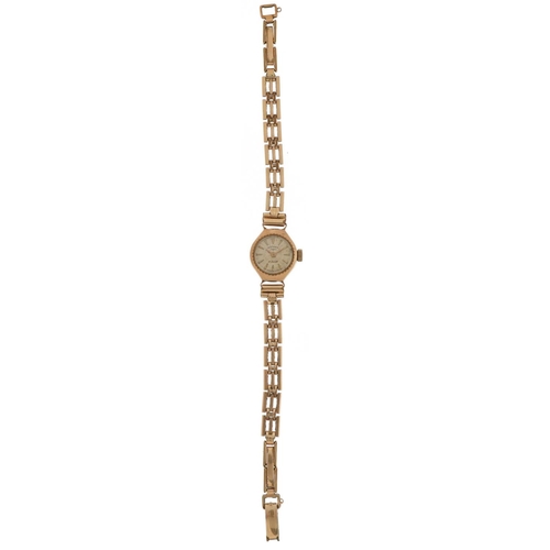 2147 - Rotary, ladies 9ct gold manual wristwatch with rolled gold strap, the case 15mm wide, total weight 1... 