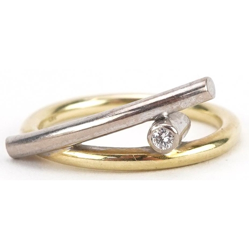 2253 - 14ct two tone gold diamond solitaire crossover ring, the diamond approximately 2.20mm in diameter, s... 