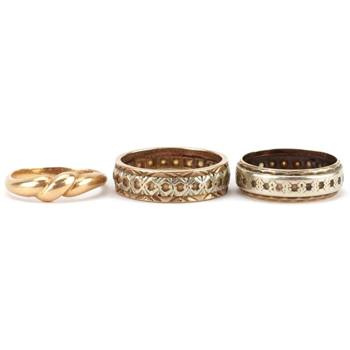 2606 - Three gold rings comprising 9ct gold clear stone eternity ring, unmarked gold clear stone eternity r... 