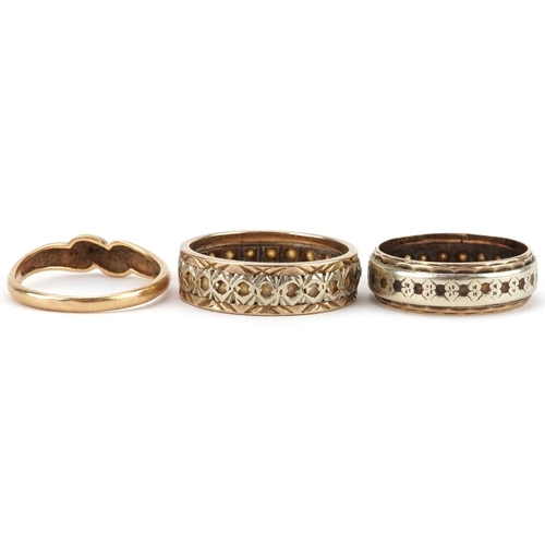 2606 - Three gold rings comprising 9ct gold clear stone eternity ring, unmarked gold clear stone eternity r... 