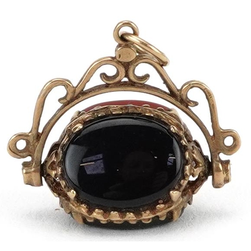 2121 - Victorian style hardstone spinner fob set with bloodstone, black onyx and carnelian, 1.9cm wide, 2.1... 