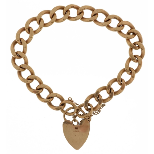 2046 - 9ct gold engraved curb link charm bracelet with 9ct gold love heart padlock, 20cm in length, 40.0g