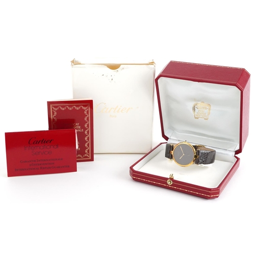 2063 - Cartier, ladies silver gilt Must de Cartier wristwatch having a burgundy dial with box and paperwork... 