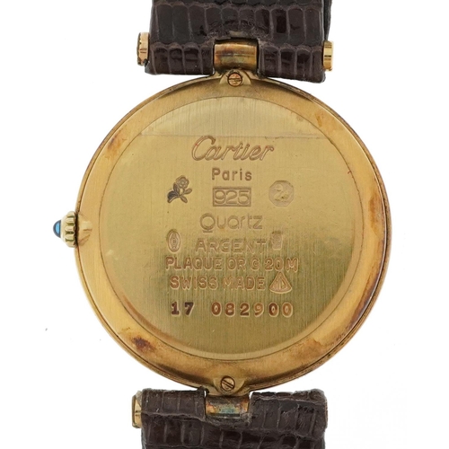 2063 - Cartier, ladies silver gilt Must de Cartier wristwatch having a burgundy dial with box and paperwork... 