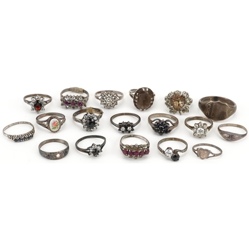 2723 - Seventeen antique and later silver rings including a unengraved shield shape signet ring, smoky quar... 