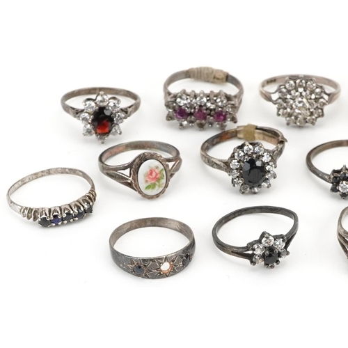 2723 - Seventeen antique and later silver rings including a unengraved shield shape signet ring, smoky quar... 