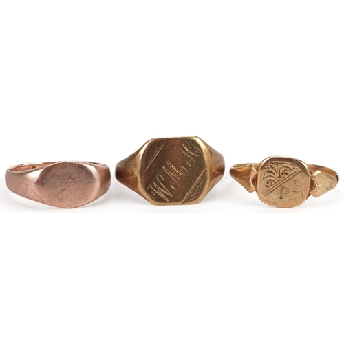 2706 - Three 9ct gold signet rings including one rose gold, total 5.4g