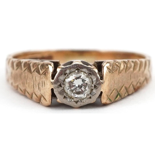 2279 - 9ct gold diamond solitaire ring with pierced setting and engraved shoulders, the diamond approximate... 