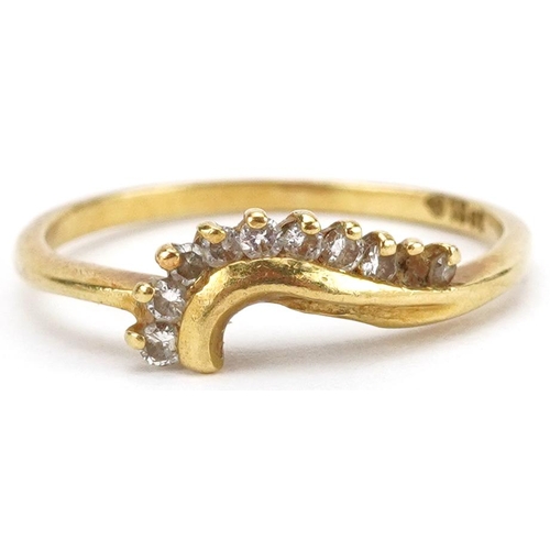 2225 - 18ct gold diamond crossover ring, size K, 1.8g