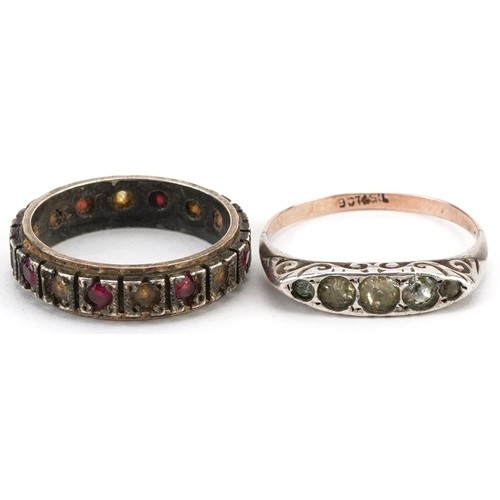 2671 - Two 9ct gold and silver rings comprising graduated five stone white spinel ring and a ruby and clear... 