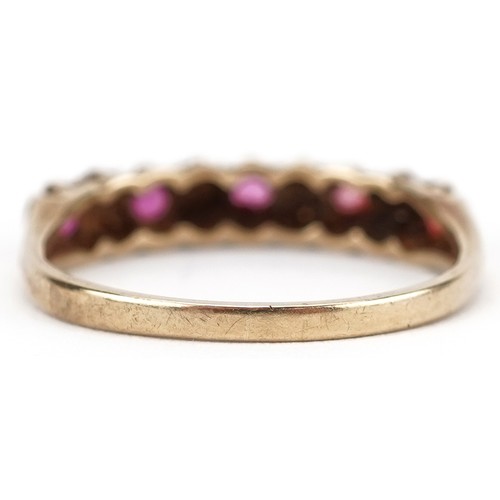 2296 - 9ct gold ruby and diamond half eternity ring set with five rubies and eight diamonds, size L, 1.6g