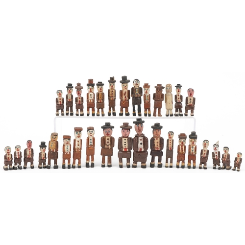 662 - Collection of Military interest hand painted carved wood figures reputedly carved in a prisoner of w... 