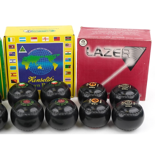 1452 - Four sets of lawn bowls including Lazer and Drake's Pride