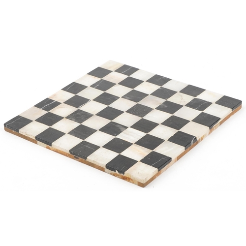 1578 - Black marble and onyx chess board, 28.5cm x 28.5cm