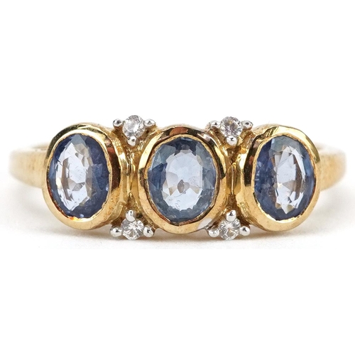 2256 - 9ct gold sapphire and white spinel seven stone ring, size N, 3.0g