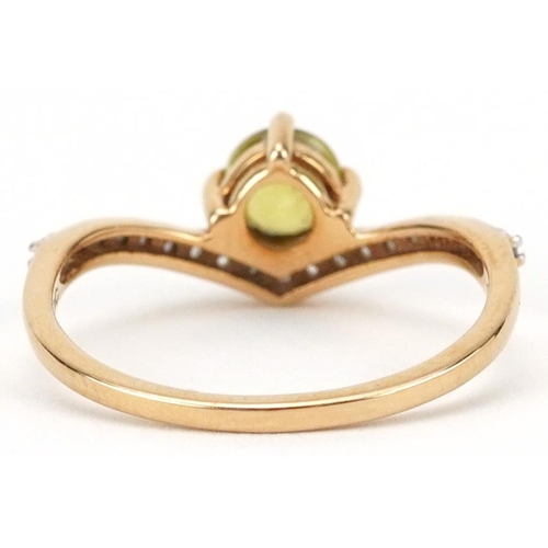 2080 - 10ct gold peridot and white spinel wishbone ring, size N, 1.9g