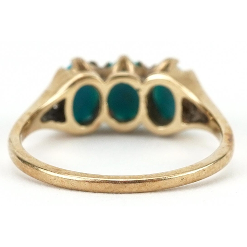 2258 - 9ct gold cabochon turquoise three stone ring, size M, 2.2g