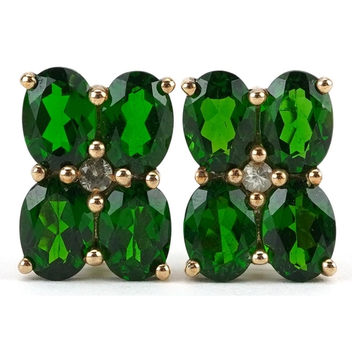 2619 - Pair of 9K gold green and clear stone flower head stud earrings, possibly olivine, 1.4cm high, 3.3g