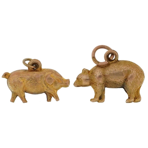 2457 - Two 9ct gold animal charms in the form of a brown bear and pig, the largest 1.7cm wide, total 1.5g