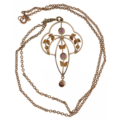 2126 - Edwardian 9ct gold garnet and seed pearl openwork pendant on a 9ct gold necklace, 5cm high and 42cm ... 