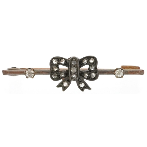 2059 - Antique unmarked gold diamond bar brooch in the form of a bow housed in a velvet and silk lined fitt... 