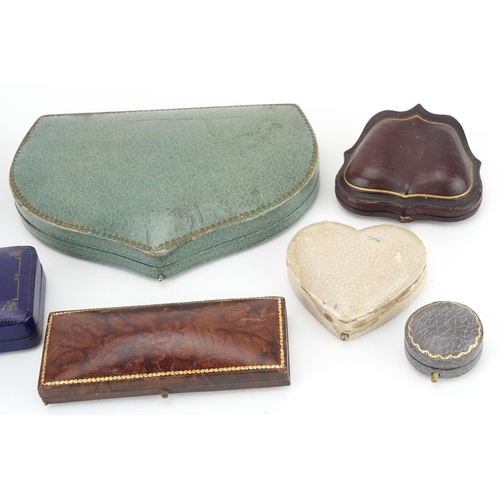 2754 - Eight 19th century and later jeweller's jewellery boxes, some tooled leather, including Horn & Peter... 