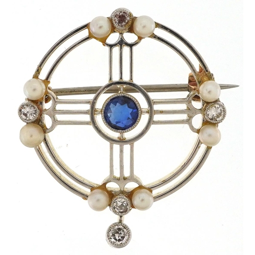 2078 - Art Deco unmarked two tone gold brooch set with five diamonds, sapphire and six seed pearls, the dia... 