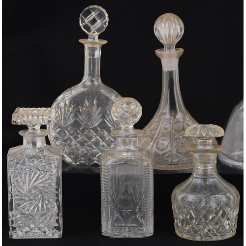 1478 - Nine glass decanters including a ship and Bohemian examples, the largest 30cm high