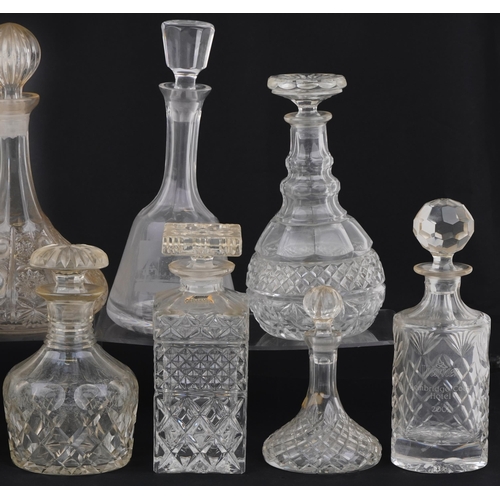 1478 - Nine glass decanters including a ship and Bohemian examples, the largest 30cm high