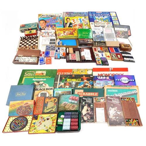 1599 - Vintage and later board games including Monopoly, Cluedo, playing cards and Trivial Pursuit