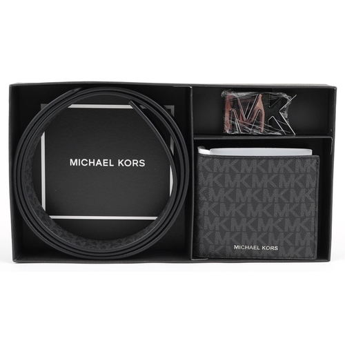 1284 - Gentlemen's Michael Kors as new gift set comprising monogrammed leather wallet and belt with box