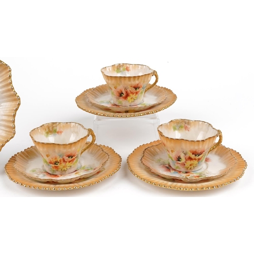 1164 - 19th century Nautilus porcelain teaware decorated with flowers comprising three trios and a sandwich... 