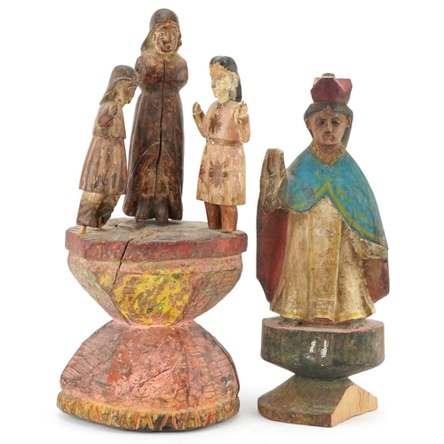 210 - Antique Spanish Colonial school religious wooden carvings including an example of three figures, the... 