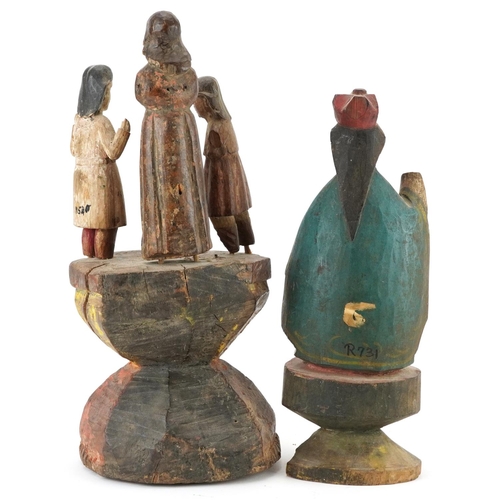 210 - Antique Spanish Colonial school religious wooden carvings including an example of three figures, the... 