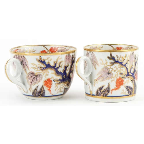 319 - 19th century English teaware hand painted in the Imari palette with flowers comprising coffee can an... 