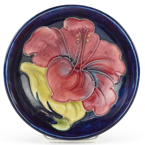 47 - Moorcroft footed bowl hand painted in the hibiscus pattern, 11.5cm in diameter