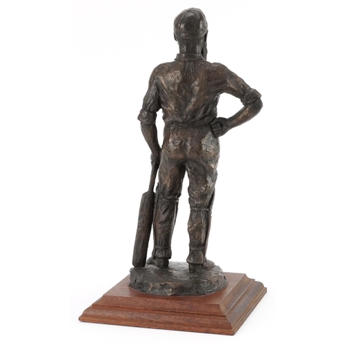 98 - Neil Godfrey, cold cast bronze statue of a cricketer raised on a square mahogany base, overall 39cm ... 