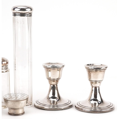 396 - Edwardian and later silver objects including a pair of dwarf candlesticks, silver mounted glass asht... 